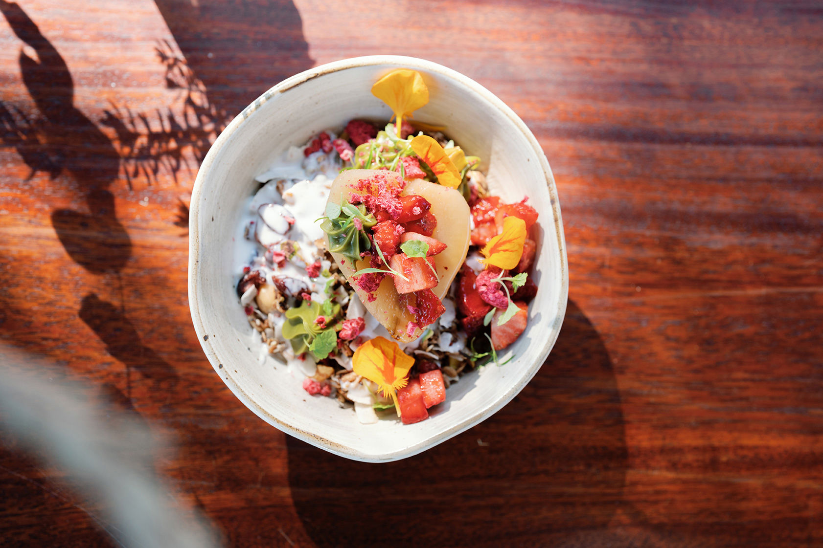 Arial view of a summer fruits bowl on a table