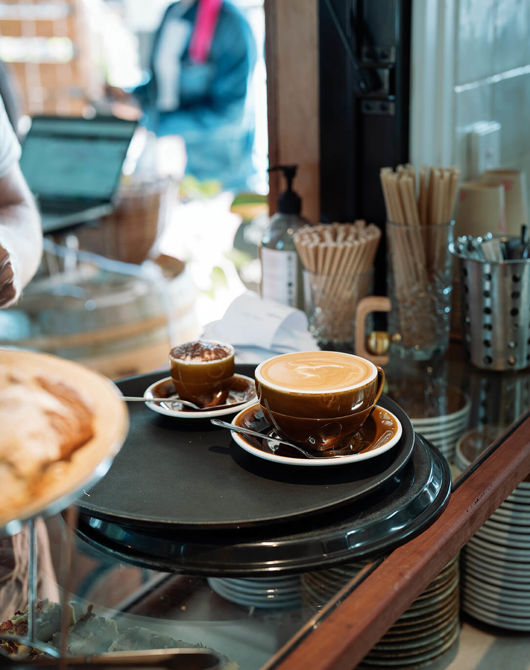 coffee-and-a-babychino-being-served-at-cubby-kiosk.jpg